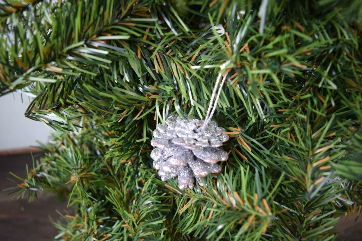 Adding pinecones to tree