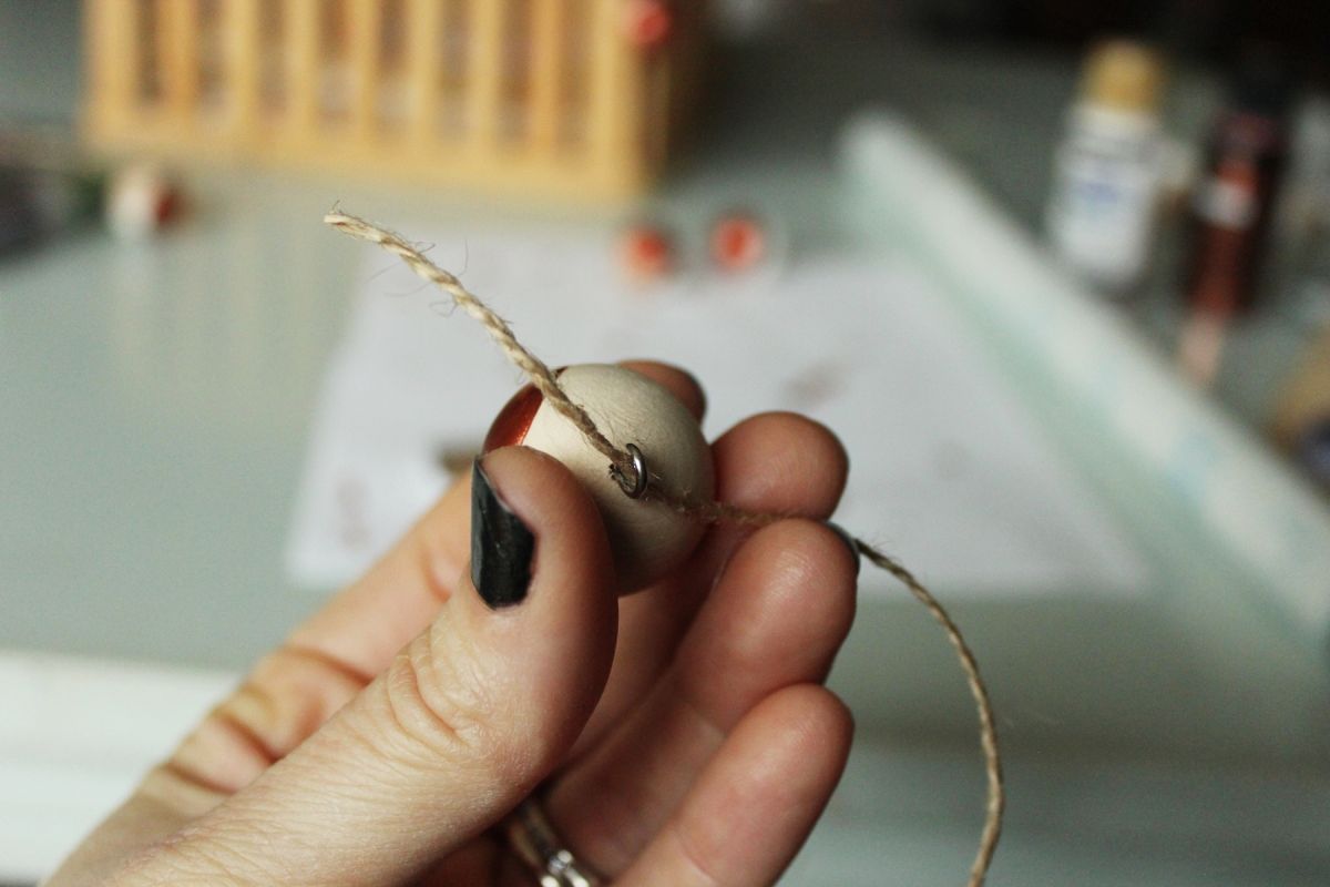Cut and thread your hanging string