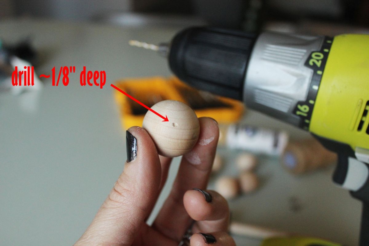 DIY Scandinavian Wooden Ornaments - drilling a small hole