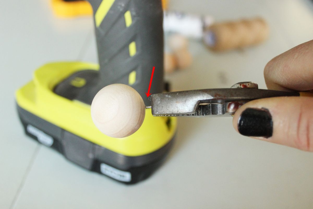 DIY Scandinavian Wooden Ornaments - Gently grip the screw eye