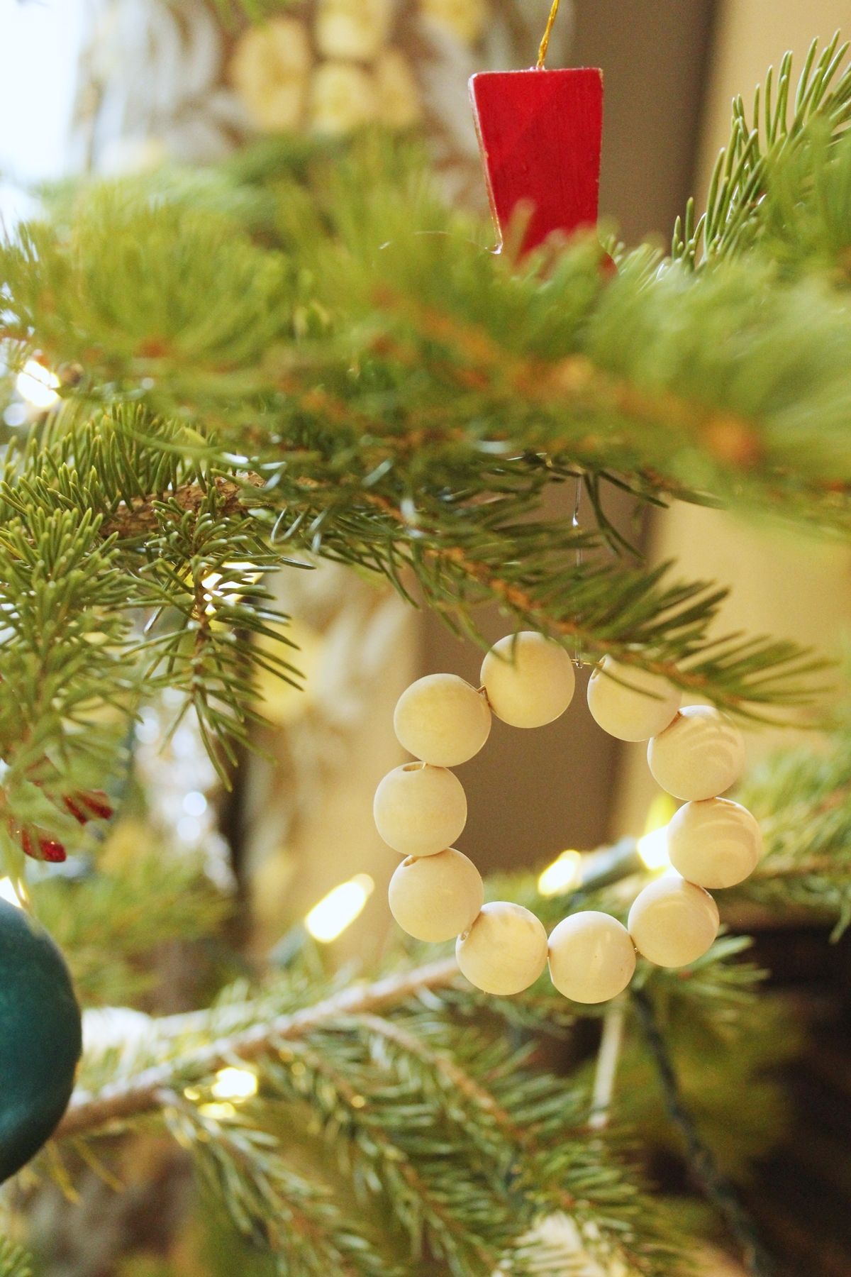 DIY Scandinavian Wooden Ornaments - mini wreath on tree