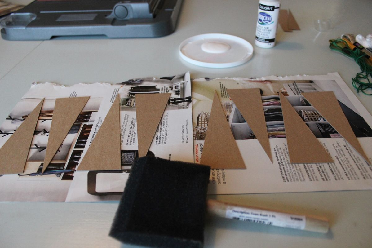 many chipboard Christmas trees shaped lay