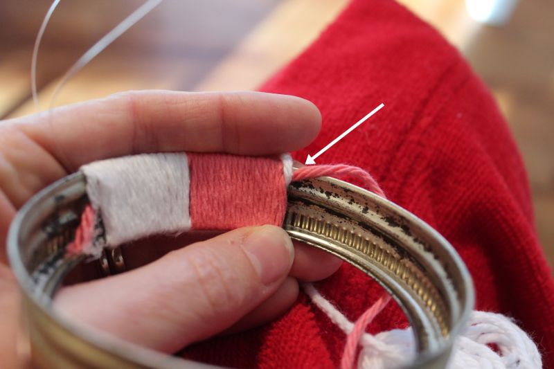 Start by gluing both ends of your yarn