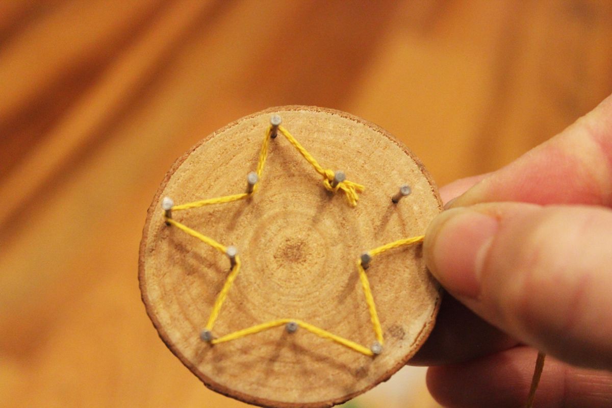DIY string art ornaments on your Christmas tree