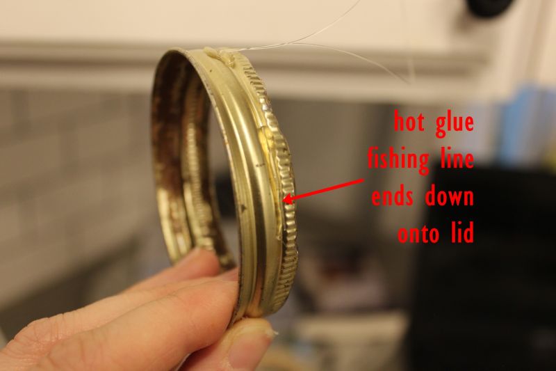 thin line of hot glue down the sides